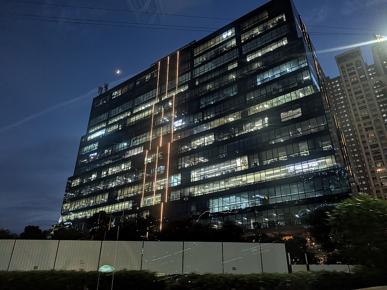 Office towers in Hyderabad's business district, where salaried employees face wage-delay disputes