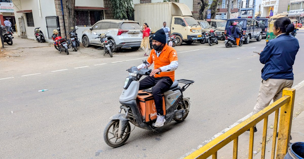 Swiggy delivery partner on a bike in Bengaluru, a gig worker covered by India 2026 social security rules