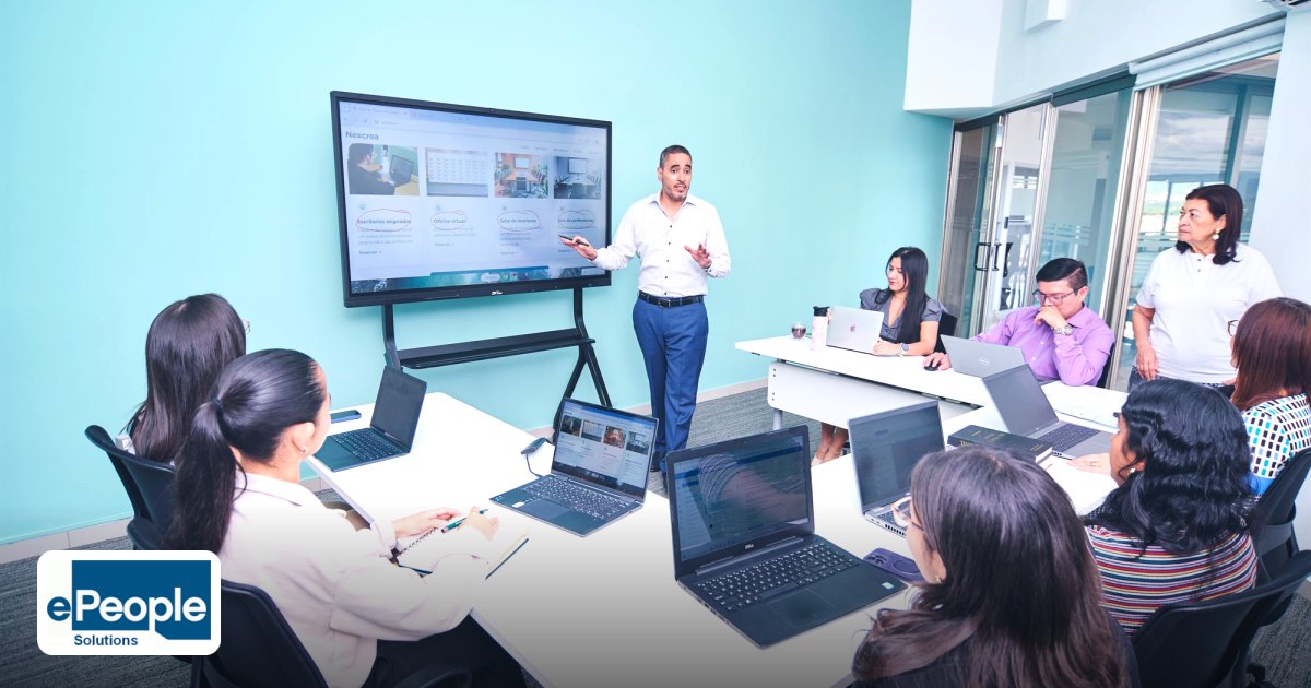 AI Corporate Training Programs for Managers India 2026: A Practical Guide - team engaged in a presentation at a modern