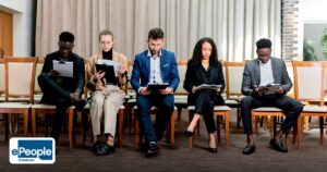 Background Verification India: What Employers Check - a diverse group of professionals attentively reviewing documents