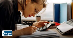 GCC Recruitment Strategies India: Campus to Executive Pipeline Guide - young woman diligently working on accounting