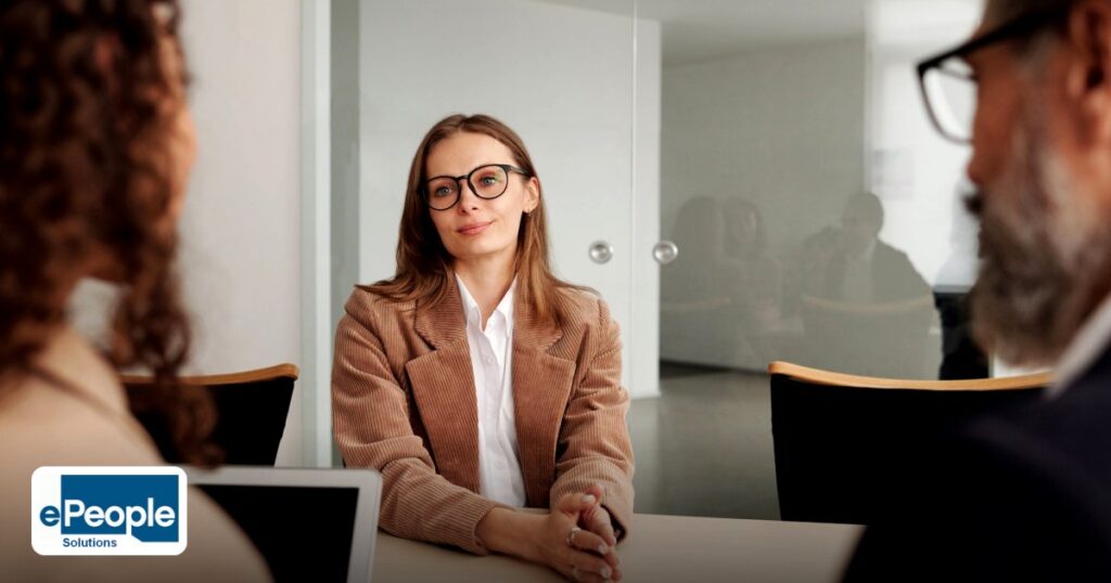 how-to-choose-a-recruitment-agency-for-gcc-expansion - young woman attending a job interview in a modern office