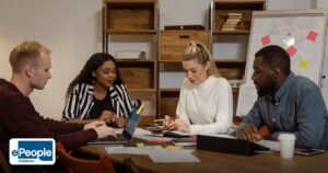 How to Choose an HR Outsourcing Partner in India for a GCC Operation - multicultural team in a modern office engaged