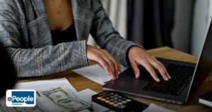 RPO Pricing Models India: Cost Structures & SLAs - a businesswoman working on finance management with cash
